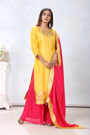 Shop beautiful yellow and pink embroidered crepe palazzo suit online in USA with dupatta. Flaunt Indian style at parties and weddings in beautiful designer dresses, salwar suits, Anarkali suits, gowns, palazzo suits from Pure Elegance Indian fashion store in USA.-side