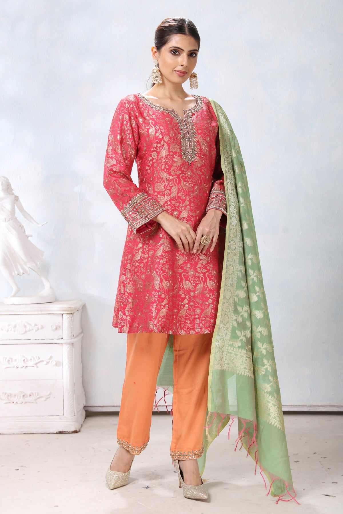 Buy beautiful pink embroidered suit online in USA with orange pants and green dupatta. Flaunt Indian style at parties and weddings in beautiful designer dresses, salwar suits, Anarkali suits, gowns, palazzo suits from Pure Elegance Indian fashion store in USA.-front