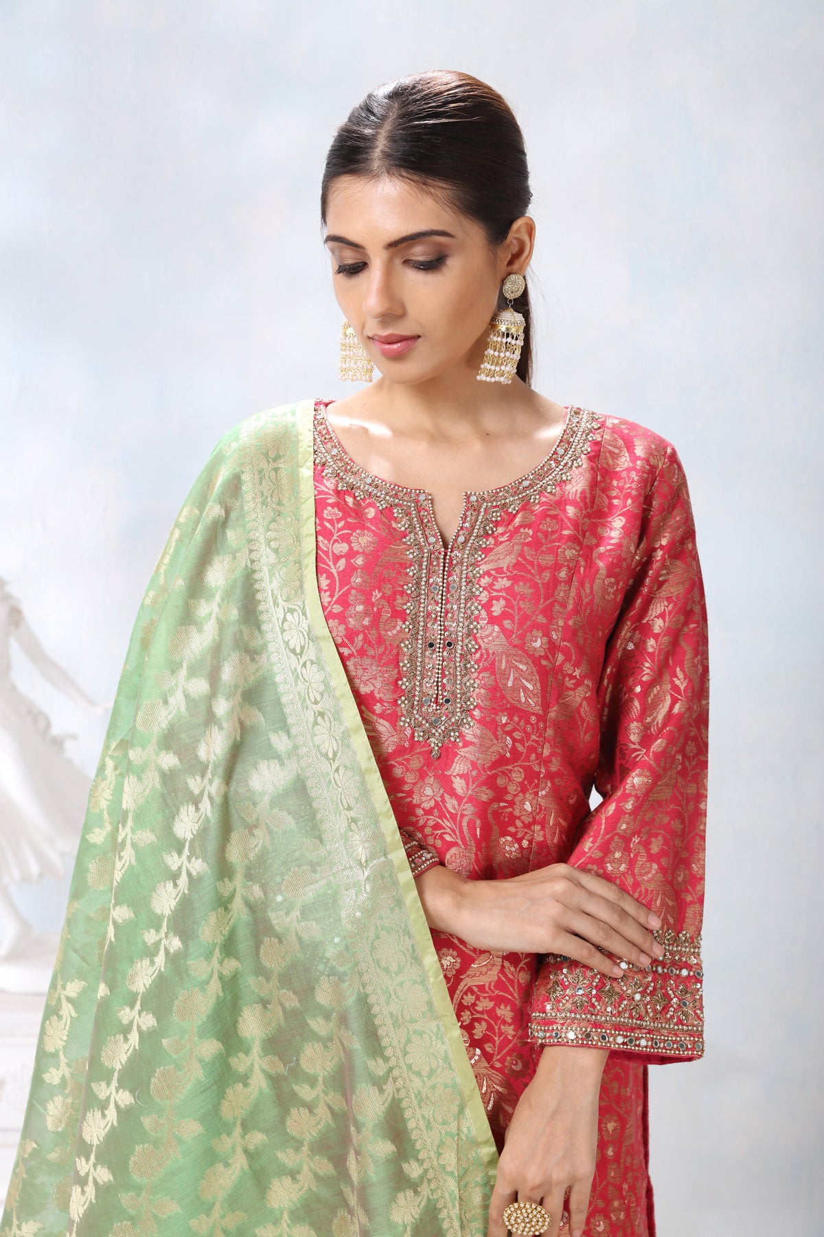 Buy beautiful pink embroidered suit online in USA with orange pants and green dupatta. Flaunt Indian style at parties and weddings in beautiful designer dresses, salwar suits, Anarkali suits, gowns, palazzo suits from Pure Elegance Indian fashion store in USA.-closeup
