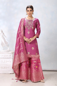 Shop stunning mauvish pink embroidered palazzo suit online in USA with dupatta. Flaunt Indian style at parties and weddings in beautiful designer dresses, salwar suits, Anarkali suits, gowns, palazzo suits from Pure Elegance Indian fashion store in USA.-full view