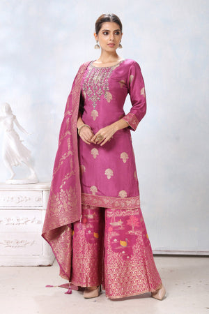 Shop stunning mauvish pink embroidered palazzo suit online in USA with dupatta. Flaunt Indian style at parties and weddings in beautiful designer dresses, salwar suits, Anarkali suits, gowns, palazzo suits from Pure Elegance Indian fashion store in USA.-left