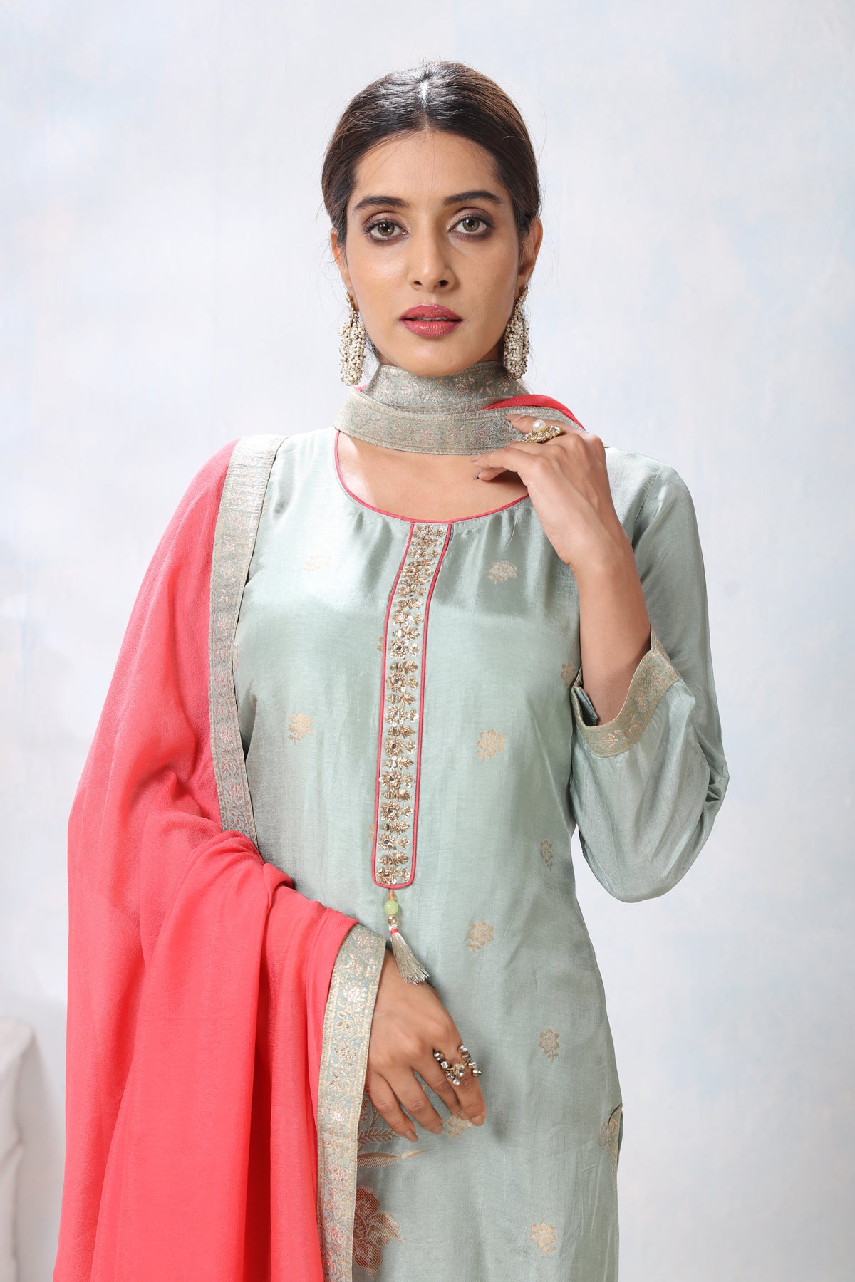 Shop beautiful light grey embroidered suit online in USA with pink palazzo and dupatta. Flaunt Indian style at parties and weddings in beautiful designer dresses, salwar suits, Anarkali suits, gowns, palazzo suits from Pure Elegance Indian fashion store in USA.-closeup