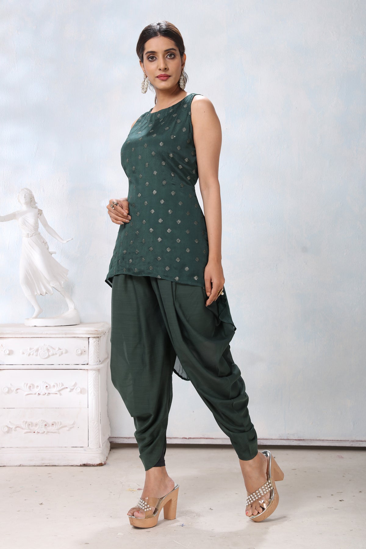 Shop stunning dark green crepe dhoti suit online in USA. Flaunt Indian style at parties and weddings in beautiful designer dresses, salwar suits, Anarkali suits, gowns, palazzo suits from Pure Elegance Indian fashion store in USA.-side