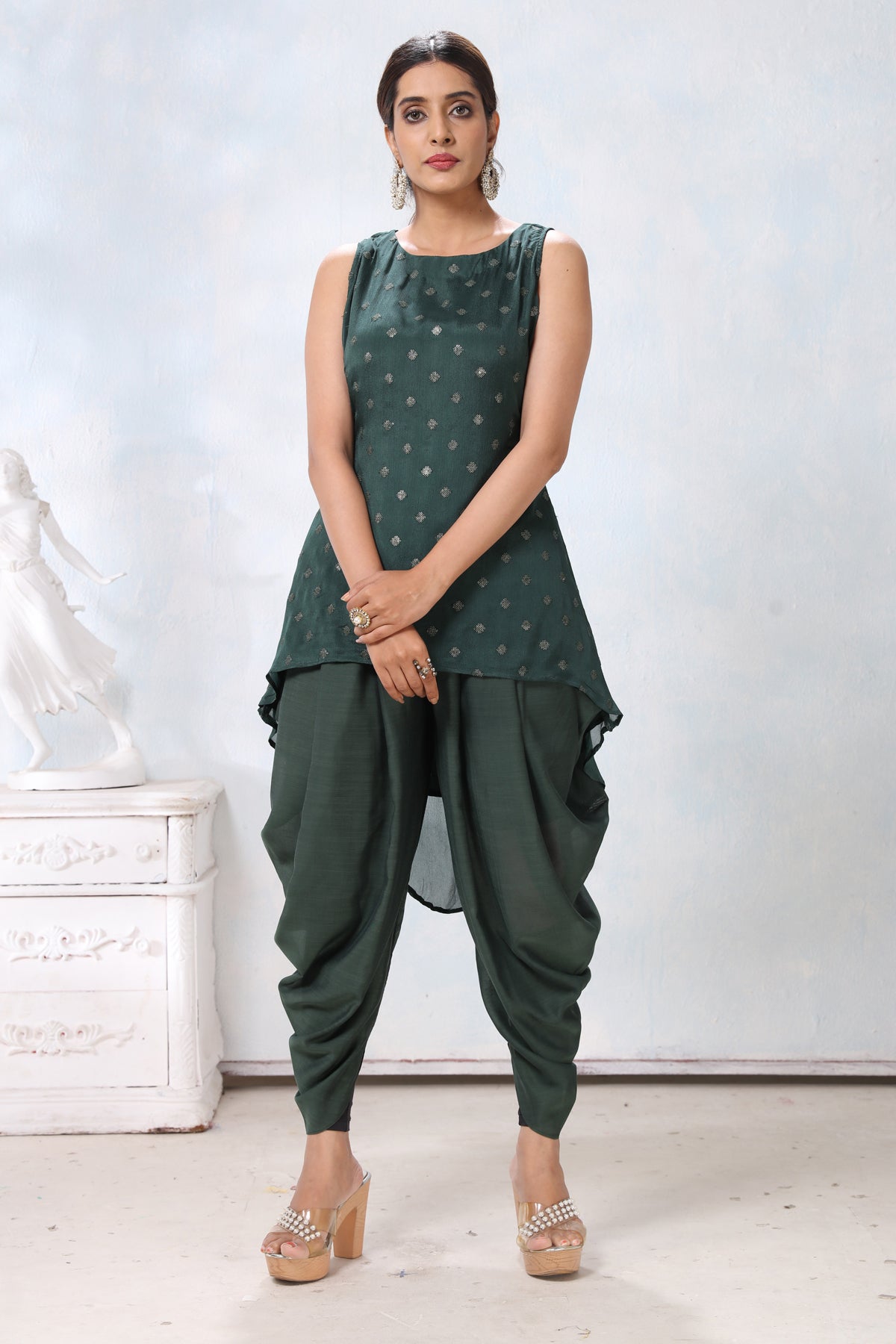 Shop stunning dark green crepe dhoti suit online in USA. Flaunt Indian style at parties and weddings in beautiful designer dresses, salwar suits, Anarkali suits, gowns, palazzo suits from Pure Elegance Indian fashion store in USA.-full view