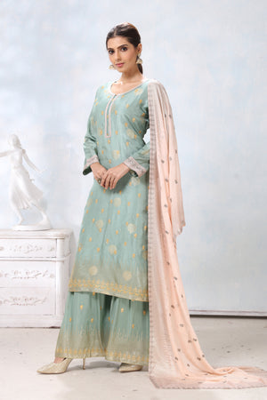 Buy stunning pastel green embroidered palazzo suit online in USA with cream dupatta. Flaunt Indian style at parties and weddings in beautiful designer dresses, salwar suits, Anarkali suits, gowns, palazzo suits from Pure Elegance Indian fashion store in USA.-side