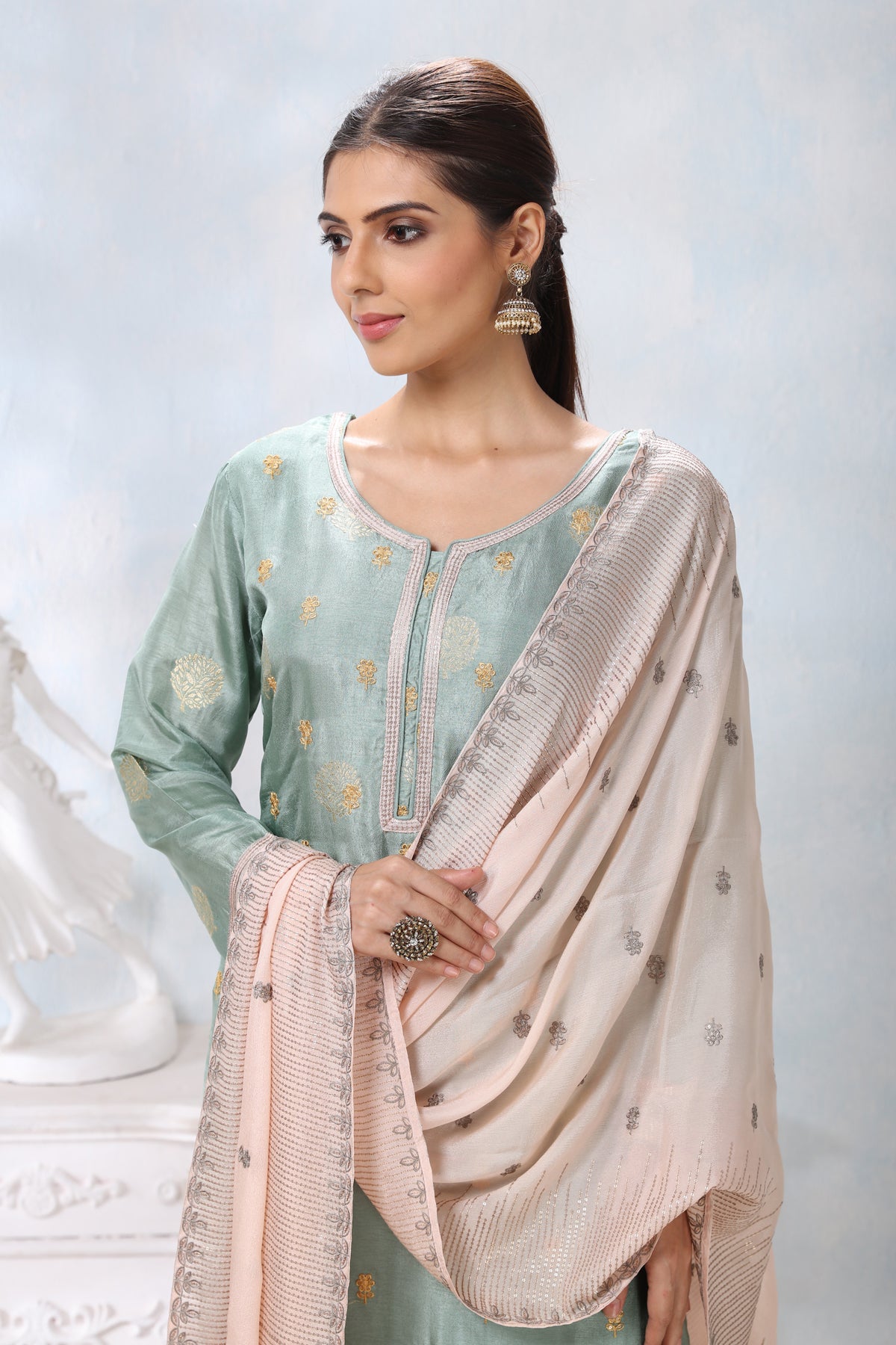 Buy stunning pastel green embroidered palazzo suit online in USA with cream dupatta. Flaunt Indian style at parties and weddings in beautiful designer dresses, salwar suits, Anarkali suits, gowns, palazzo suits from Pure Elegance Indian fashion store in USA.-closeup