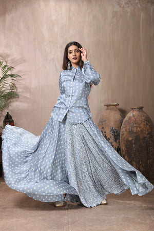 Shop stunning grey Bandhej print skirt set online in USA. Flaunt Indian style at parties and weddings in beautiful designer dresses, salwar suits, Anarkali suits, gowns, palazzo suits from Pure Elegance Indian fashion store in USA.-front