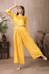 Shop stunning yellow Bandhej print crepe silk jumpsuit online in USA. Flaunt Indian style at parties and weddings in beautiful designer dresses, salwar suits, Anarkali suits, gowns, palazzo suits from Pure Elegance Indian fashion store in USA.-full view