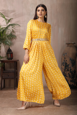 Shop stunning yellow Bandhej print crepe silk jumpsuit online in USA. Flaunt Indian style at parties and weddings in beautiful designer dresses, salwar suits, Anarkali suits, gowns, palazzo suits from Pure Elegance Indian fashion store in USA.-side