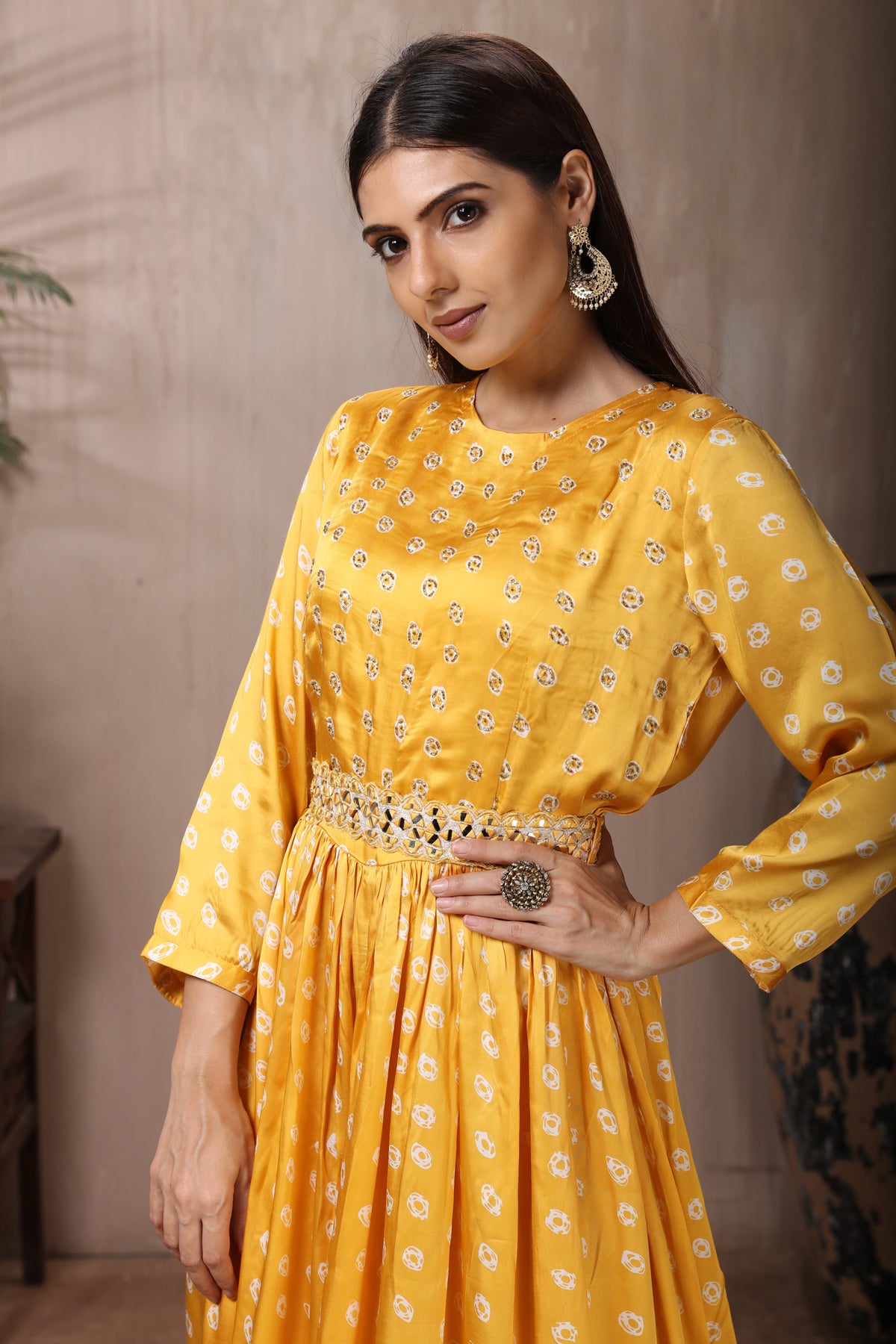 Shop stunning yellow Bandhej print crepe silk jumpsuit online in USA. Flaunt Indian style at parties and weddings in beautiful designer dresses, salwar suits, Anarkali suits, gowns, palazzo suits from Pure Elegance Indian fashion store in USA.-closeup