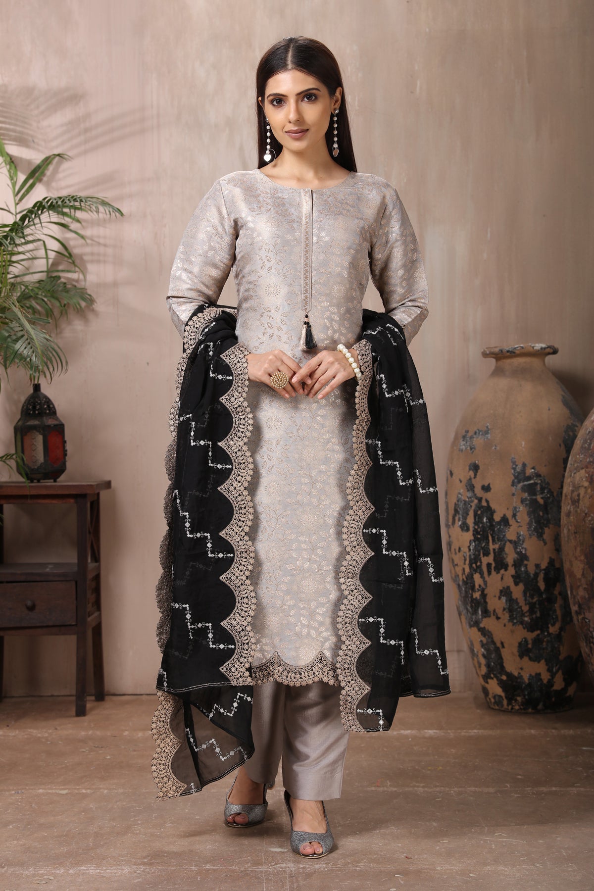 Shop gorgeous embroidered pant suit online in USA with black dupatta. Flaunt Indian style at parties and weddings in beautiful designer dresses, salwar suits, Anarkali suits, gowns, palazzo suits from Pure Elegance Indian fashion store in USA.-front