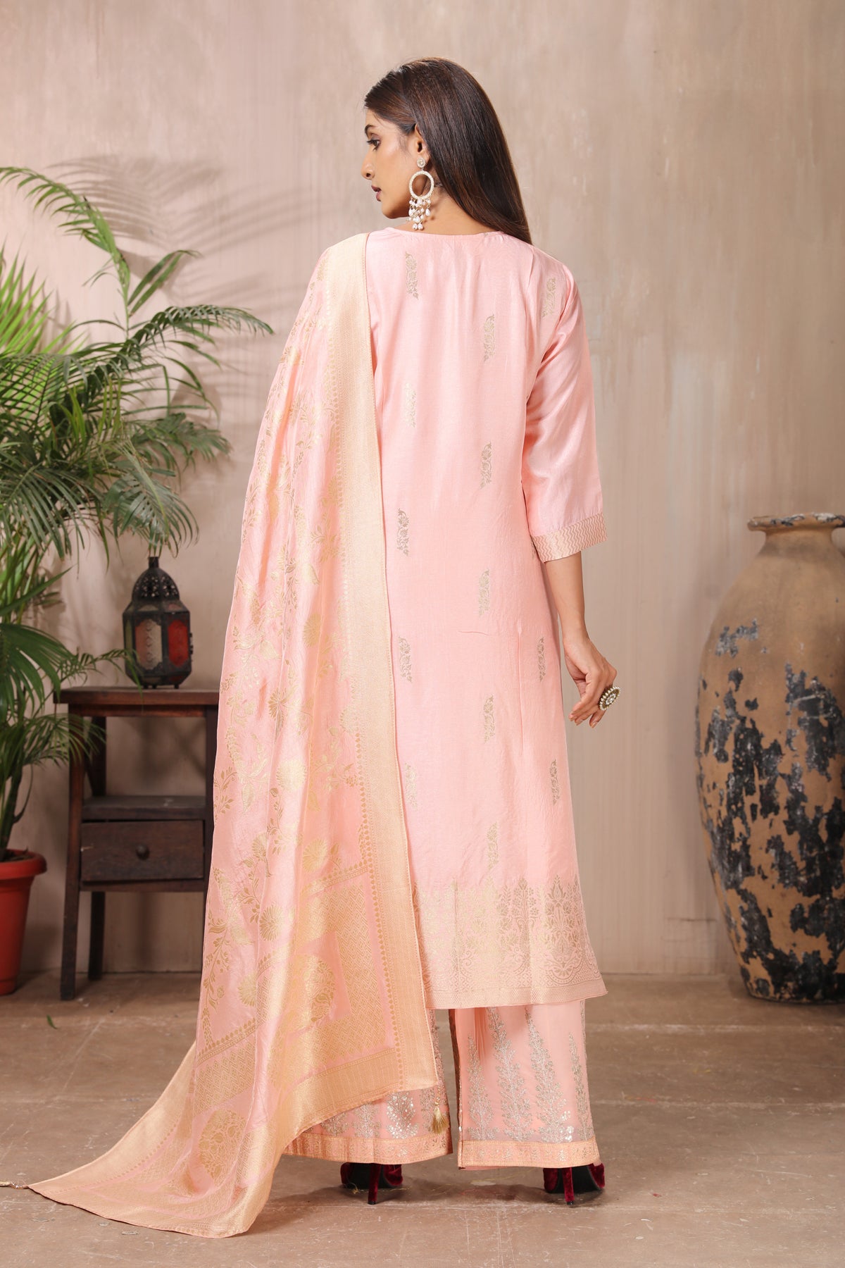 Buy gorgeous pastel pink embroidered palazzo suit online in USA with dupatta. Flaunt Indian style at parties and weddings in beautiful designer dresses, salwar suits, Anarkali suits, gowns, palazzo suits from Pure Elegance Indian fashion store in USA.-back