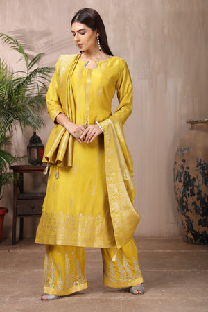 Shop stunning yellow embroidered palazzo suit online in USA with dupatta. Flaunt Indian style at parties and weddings in beautiful designer dresses, salwar suits, Anarkali suits, gowns, palazzo suits from Pure Elegance Indian fashion store in USA.-side