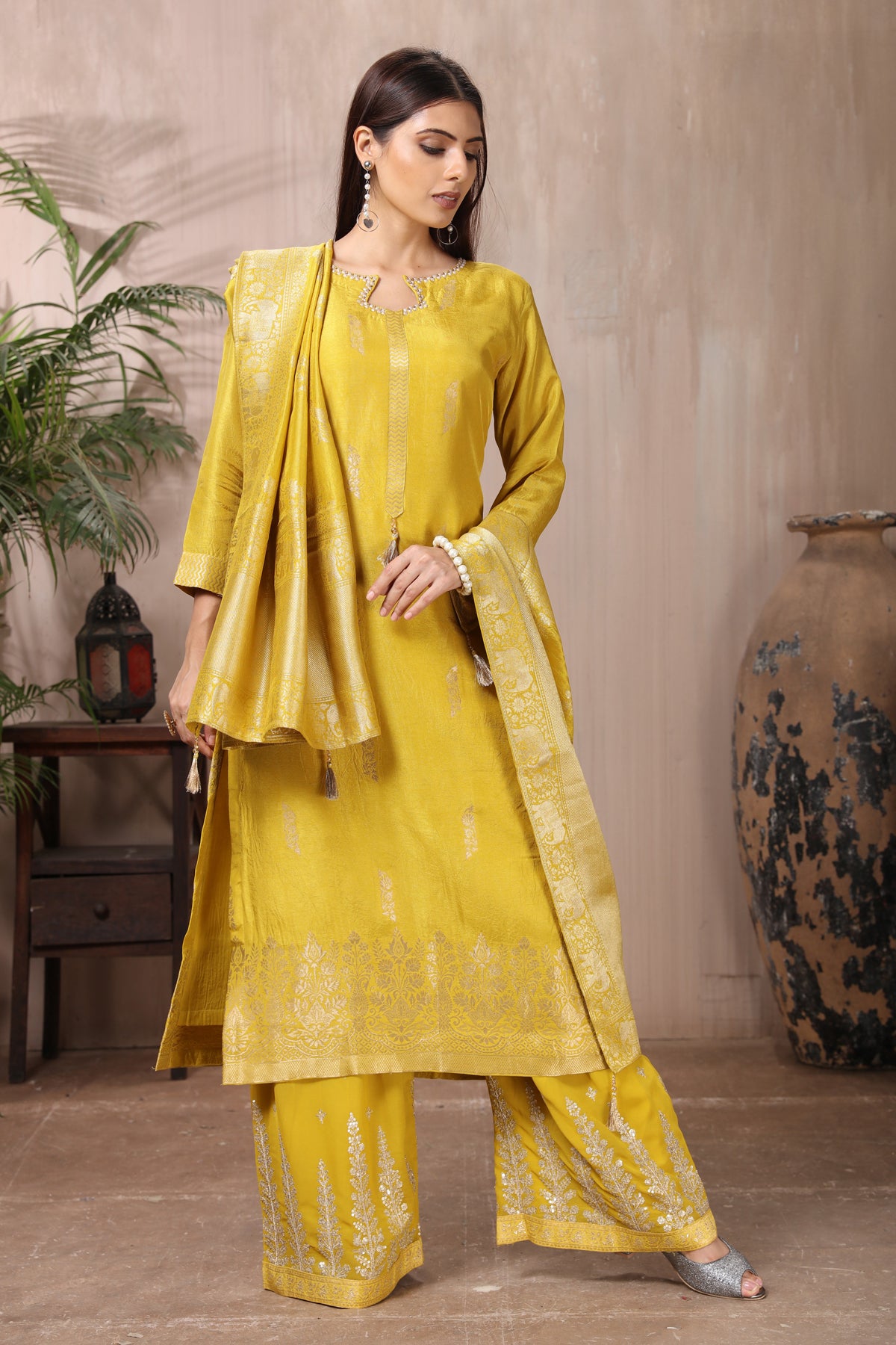 Shop stunning yellow embroidered palazzo suit online in USA with dupatta. Flaunt Indian style at parties and weddings in beautiful designer dresses, salwar suits, Anarkali suits, gowns, palazzo suits from Pure Elegance Indian fashion store in USA.-front
