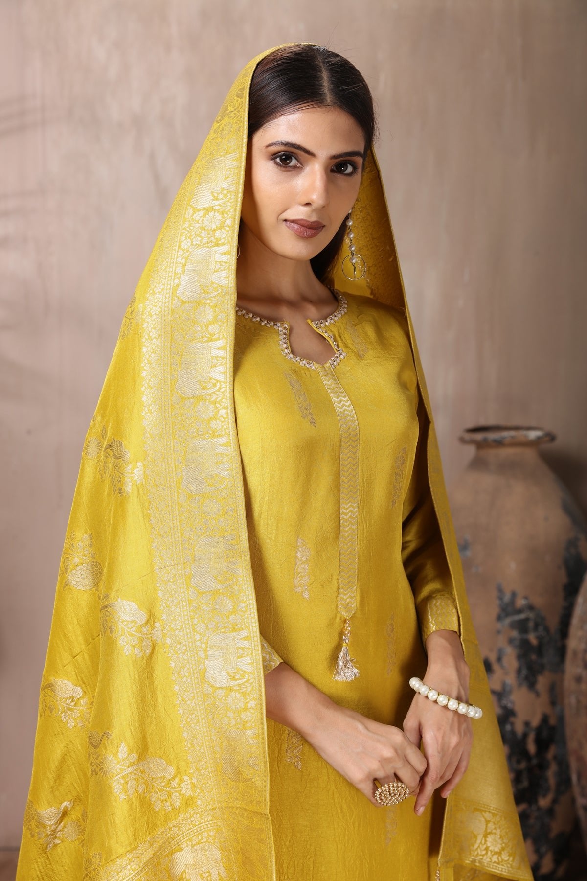 Shop stunning yellow embroidered palazzo suit online in USA with dupatta. Flaunt Indian style at parties and weddings in beautiful designer dresses, salwar suits, Anarkali suits, gowns, palazzo suits from Pure Elegance Indian fashion store in USA.-closeup
