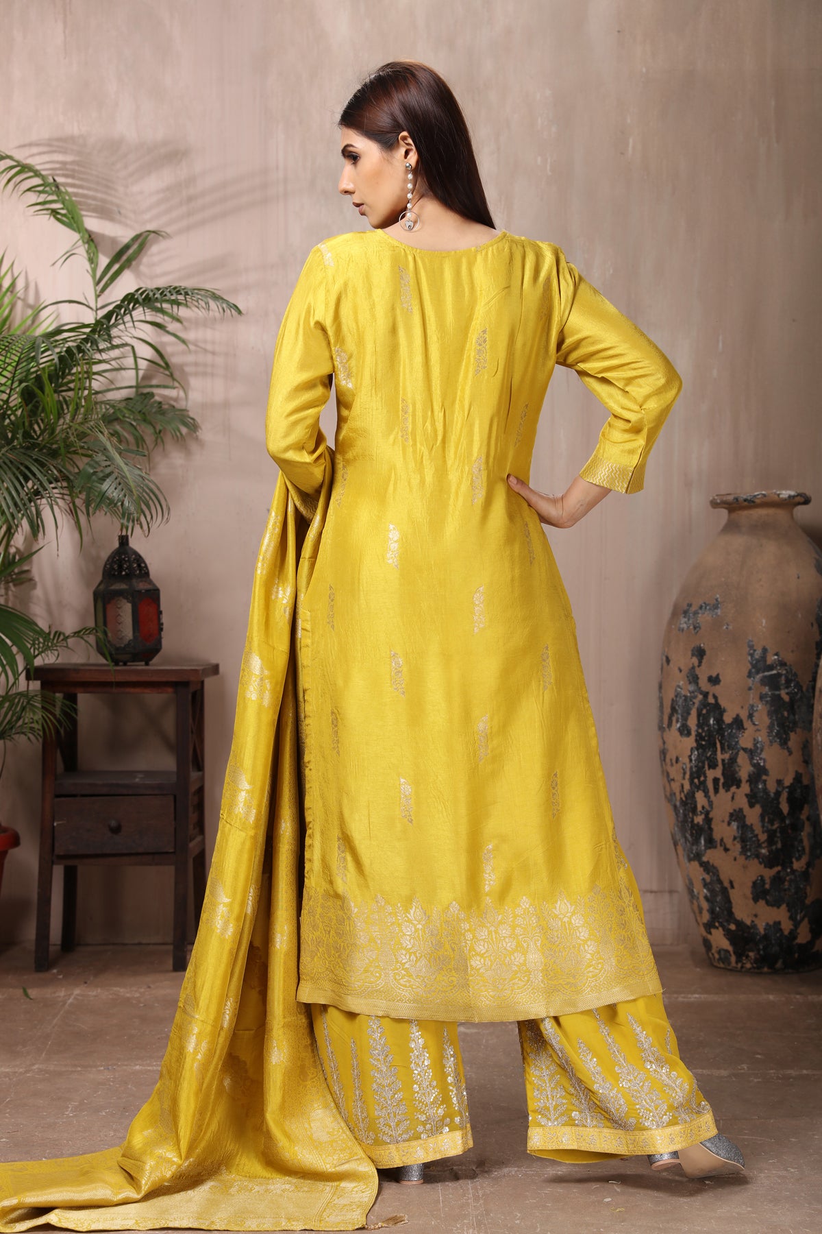 Shop stunning yellow embroidered palazzo suit online in USA with dupatta. Flaunt Indian style at parties and weddings in beautiful designer dresses, salwar suits, Anarkali suits, gowns, palazzo suits from Pure Elegance Indian fashion store in USA.-back