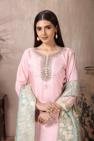 Buy gorgeous powder pink embroidered sharara suit online in USA with grey dupatta. Flaunt Indian style at parties and weddings in beautiful designer dresses, salwar suits, Anarkali suits, gowns, palazzo suits from Pure Elegance Indian fashion store in USA.-closeup