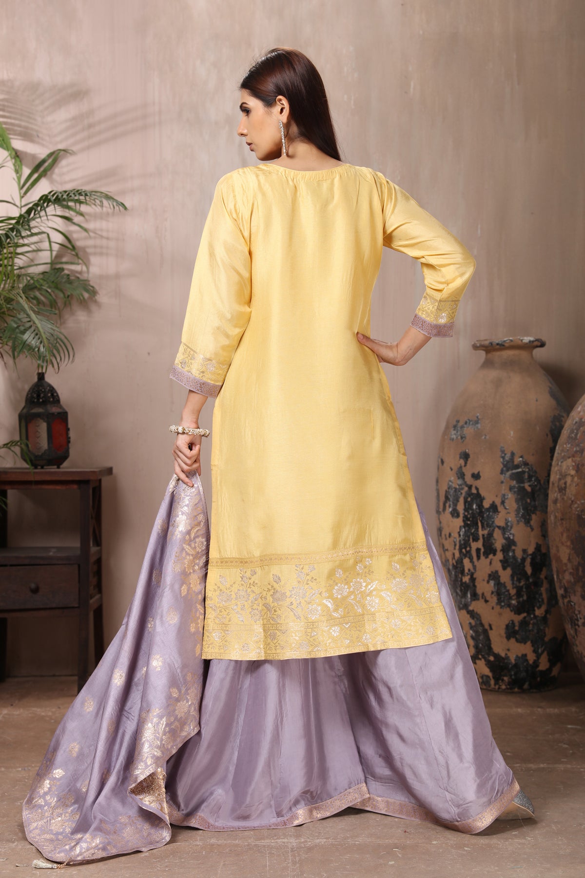 Shop stunning yellow and grey embroidered silk suit online in USA with dupatta. Flaunt Indian style at parties and weddings in beautiful designer dresses, salwar suits, Anarkali suits, gowns, palazzo suits from Pure Elegance Indian fashion store in USA.-back