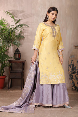 Shop stunning yellow and grey embroidered silk suit online in USA with dupatta. Flaunt Indian style at parties and weddings in beautiful designer dresses, salwar suits, Anarkali suits, gowns, palazzo suits from Pure Elegance Indian fashion store in USA.-side