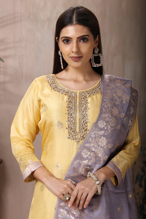 Shop stunning yellow and grey embroidered silk suit online in USA with dupatta. Flaunt Indian style at parties and weddings in beautiful designer dresses, salwar suits, Anarkali suits, gowns, palazzo suits from Pure Elegance Indian fashion store in USA.-closeup