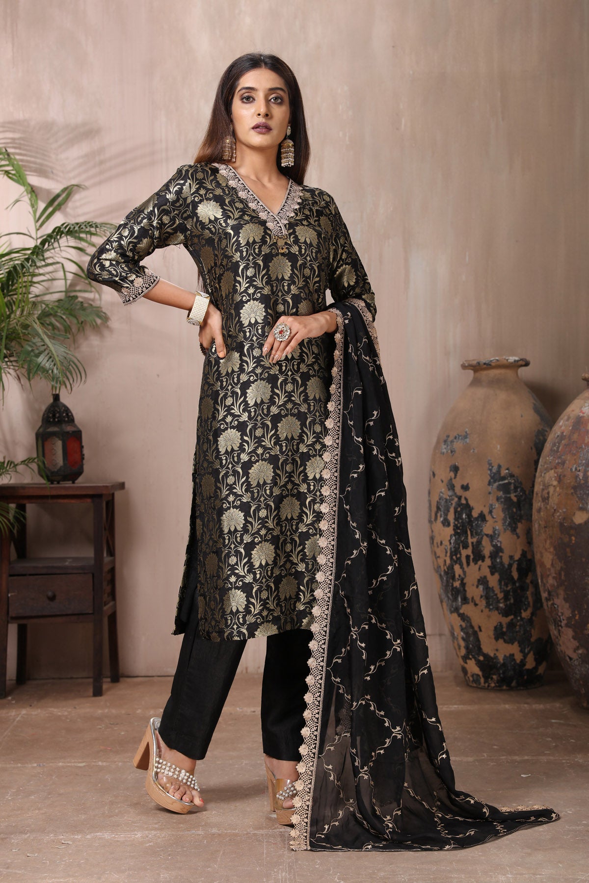 Shop stunning black Banarasi suit online in USA with pants and dupatta. Flaunt Indian style at parties and weddings in beautiful designer dresses, salwar suits, Anarkali suits, gowns, palazzo suits from Pure Elegance Indian fashion store in USA.-front
