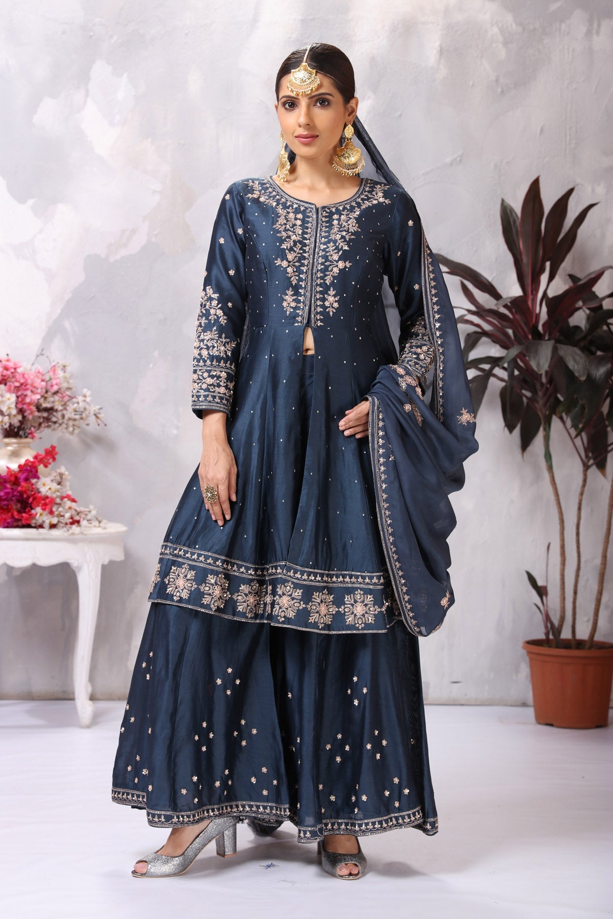 Shop stunning dark blue embroidered sharara suit online in USA with dupatta. Flaunt Indian style at parties and weddings in beautiful designer dresses, salwar suits, Anarkali suits, gowns, palazzo suits from Pure Elegance Indian fashion store in USA.-front