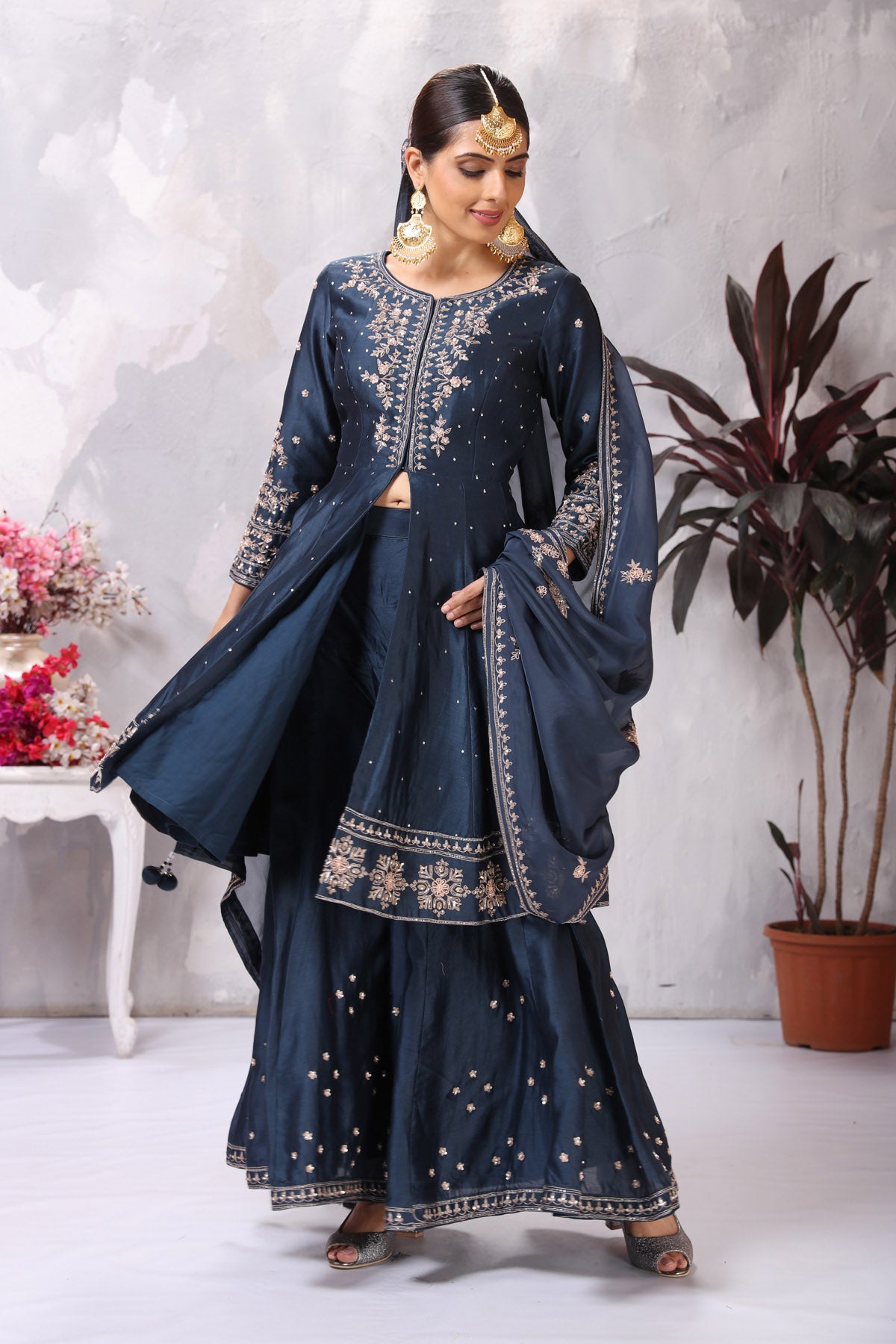 Shop stunning dark blue embroidered sharara suit online in USA with dupatta. Flaunt Indian style at parties and weddings in beautiful designer dresses, salwar suits, Anarkali suits, gowns, palazzo suits from Pure Elegance Indian fashion store in USA.-palazzo