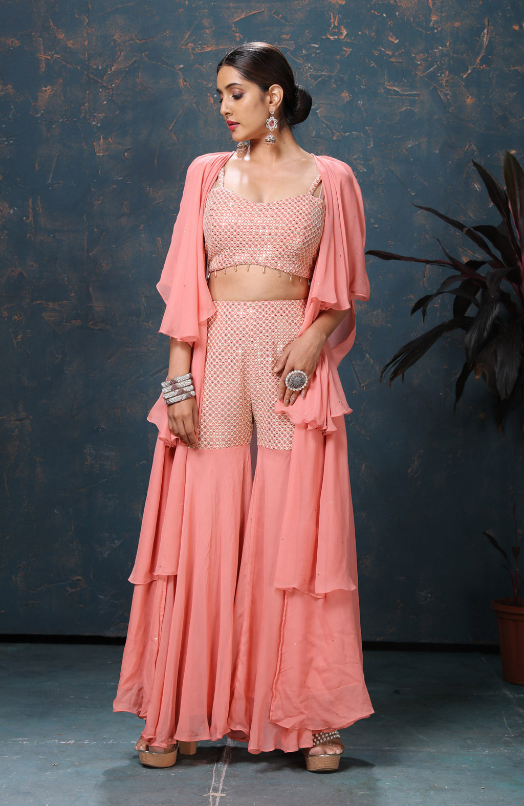 Shop gorgeous peach embroidered three piece palazzo suit online in USA with cape. Flaunt Indian style at parties and weddings in beautiful designer dresses, salwar suits, Anarkali suits, gowns, palazzo suits from Pure Elegance Indian fashion store in USA.-full view