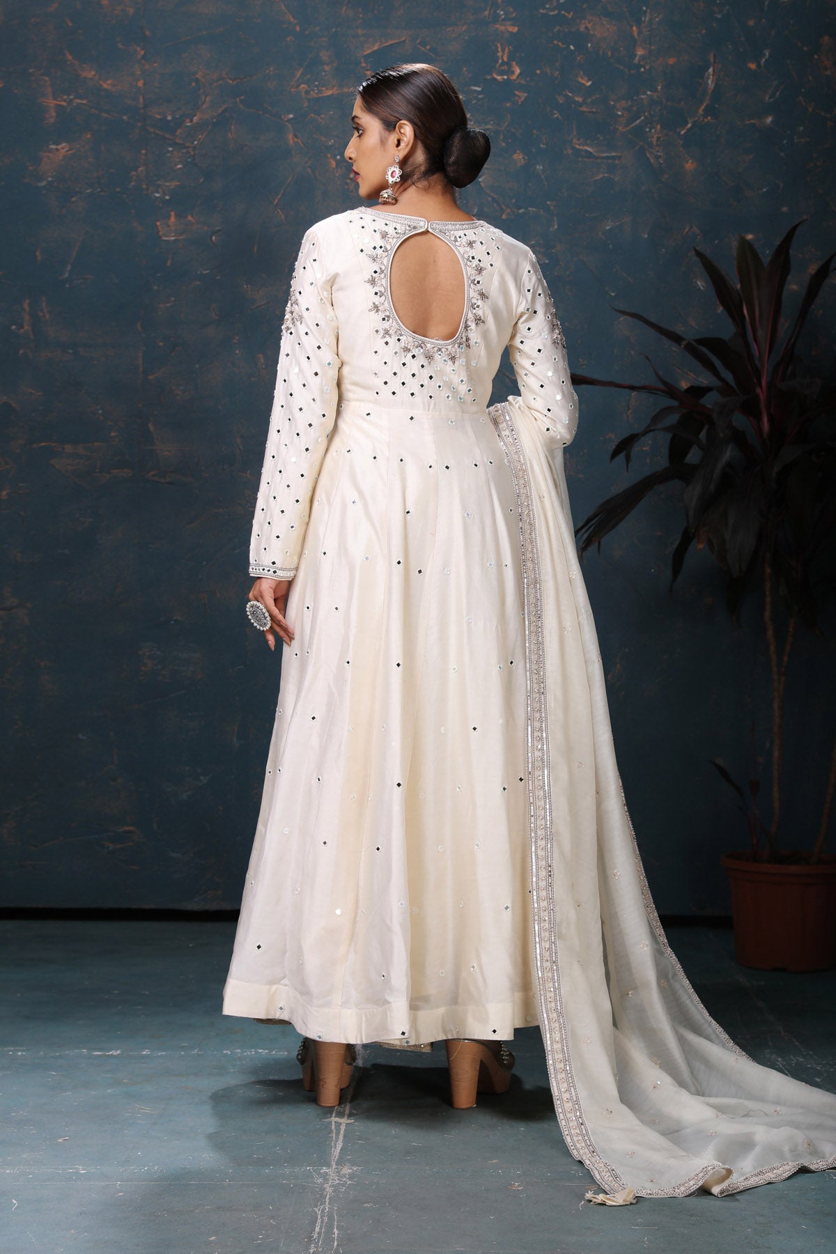Shop stunning off-white embroidered Anarkali suit online in USA with dupatta. Flaunt Indian style at parties and weddings in beautiful designer dresses, salwar suits, Anarkali suits, gowns, palazzo suits from Pure Elegance Indian fashion store in USA.-back