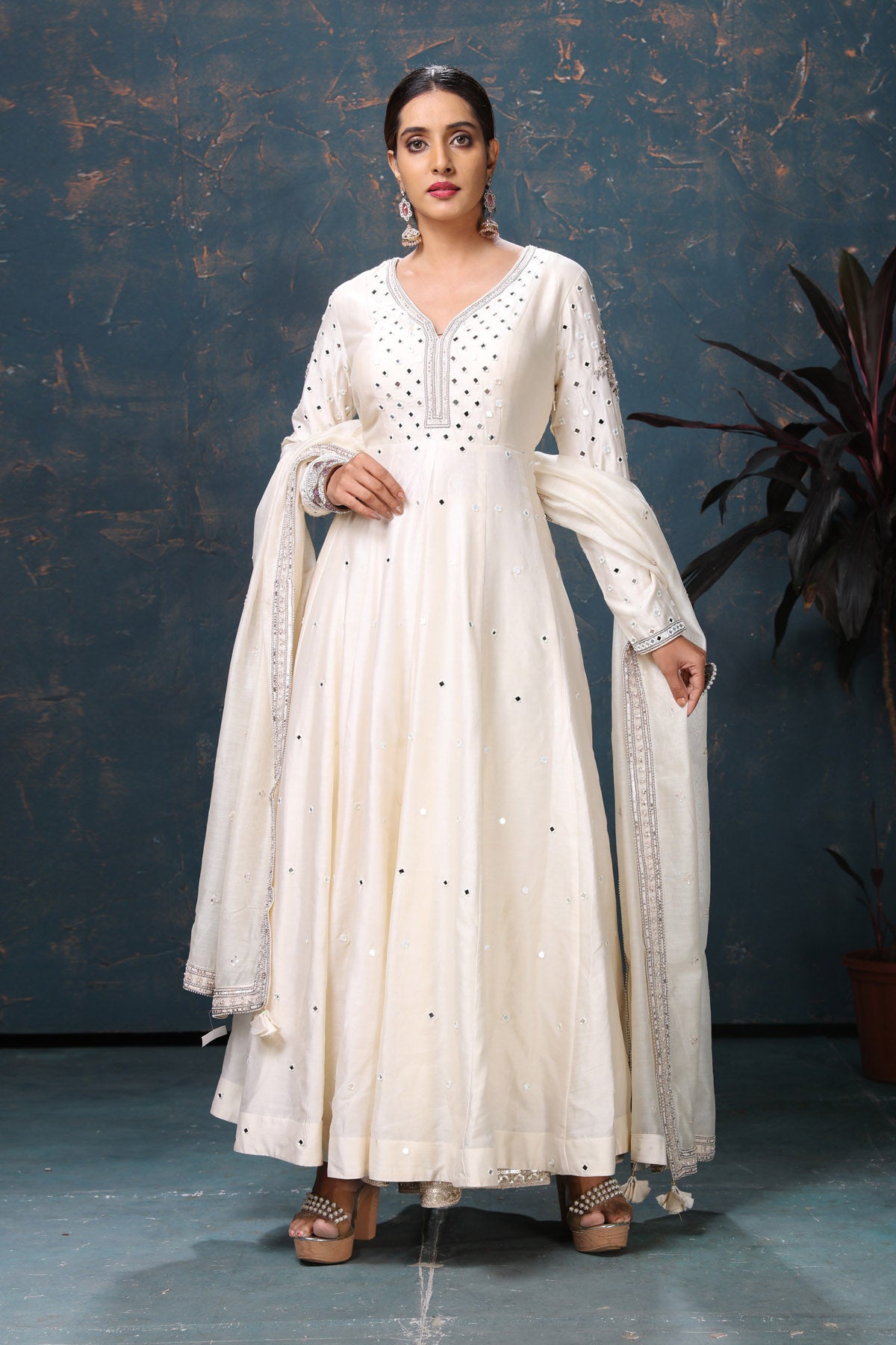 Shop stunning off-white embroidered Anarkali suit online in USA with dupatta. Flaunt Indian style at parties and weddings in beautiful designer dresses, salwar suits, Anarkali suits, gowns, palazzo suits from Pure Elegance Indian fashion store in USA.-side