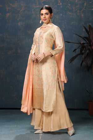 Shop stunning embroidered palazzo suit online in USA with peach dupatta. Flaunt Indian style at parties and weddings in beautiful designer dresses, salwar suits, Anarkali suits, gowns, palazzo suits from Pure Elegance Indian fashion store in USA.-left