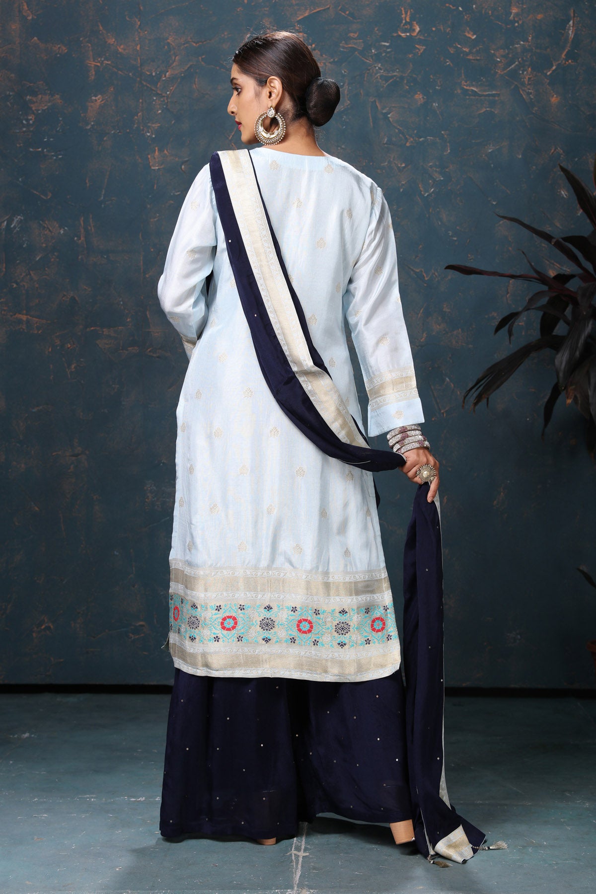 Shop beautiful powder blue embroidered suit online in USA with navy blue dupatta. Flaunt Indian style at parties and weddings in beautiful designer dresses, salwar suits, Anarkali suits, gowns, palazzo suits from Pure Elegance Indian fashion store in USA.-back