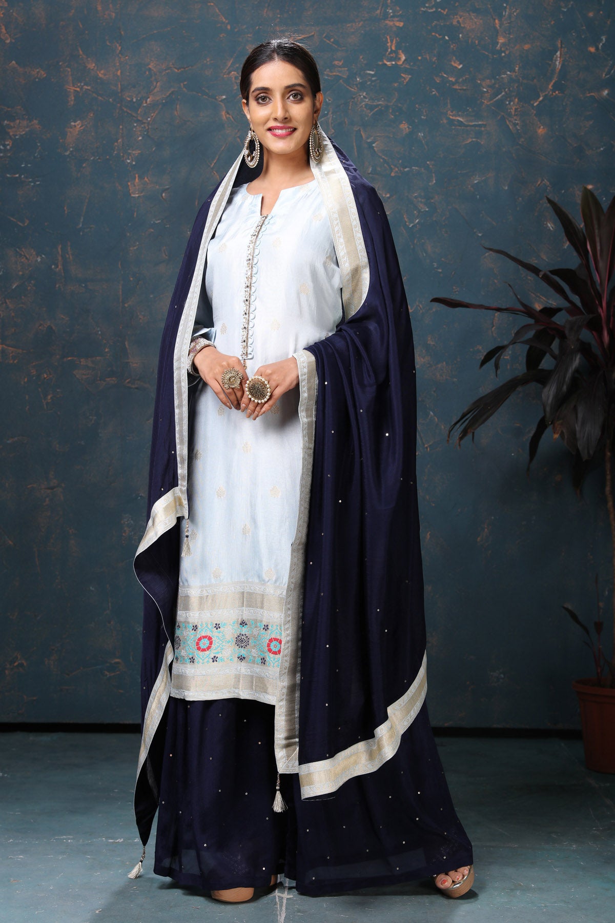 Shop beautiful powder blue embroidered suit online in USA with navy blue dupatta. Flaunt Indian style at parties and weddings in beautiful designer dresses, salwar suits, Anarkali suits, gowns, palazzo suits from Pure Elegance Indian fashion store in USA.-full view