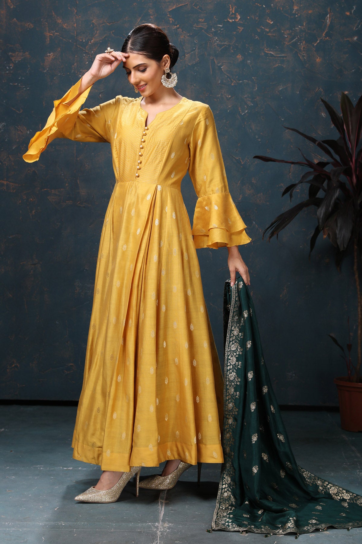 Shop stunning yellow embroidered chanderi silk Anarkali suit online in USA with green dupatta. Flaunt Indian style at parties and weddings in beautiful designer dresses, salwar suits, Anarkali suits, gowns, palazzo suits from Pure Elegance Indian fashion store in USA.-full view