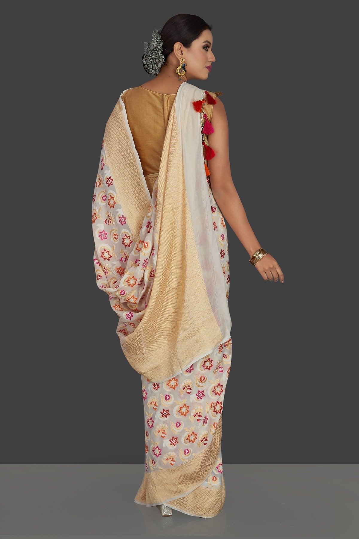 Buy beautiful cream georgette Banarasi sari online in USA with zari minakari floral work. Radiate elegance with georgette sarees, Banarasi sarees, handwoven sarees from Pure Elegance Indian fashion boutique in USA. We bring a especially curated collection of ethnic sarees for Indian women in USA under one roof!-back